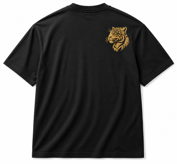 Black cotton t-shirt with a leopard face embroidered in gold and tan thread on the chest