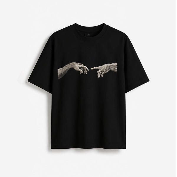 Black oversized t-shirt with Renaissance Creation Hands design in high-density embroidery
